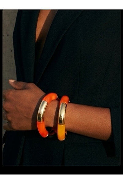 COCOSH TAKI Red, orange, and gold detailed multi-strand bracelet.