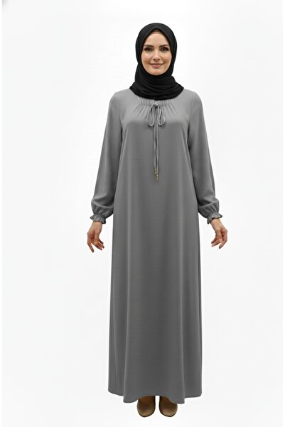 modaselda tesettür bağcık detaylı kolu lastikli anne elbisesi