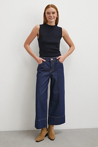 Never more بنطلون جينز بخصر عالٍ وتفاصيل مميزة باللون الأزرق الداكن