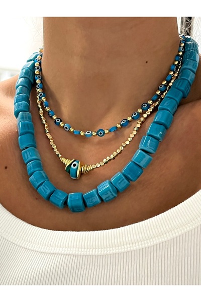 Twinssis Accessories قلادة موديل مكعب مرصع بالخرز الذهبي على شكل عين الحسد