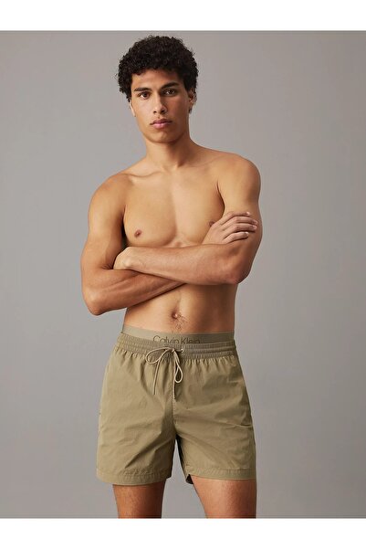 Calvin Klein سروال سباحة أخضر للرجال من كالفن كلاين