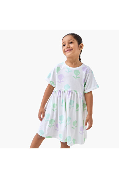 Juniors فستان بقصة حرف A مطبوع عليه زهور، بياقة دائرية وأكمام قصيرة طويلة