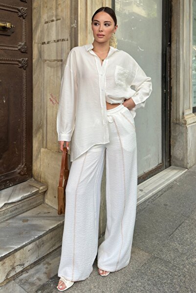 Trend Alaçatı Stili بنطال أبيض بخياطة راعية وجيب مزدوج للنساء V00033-A