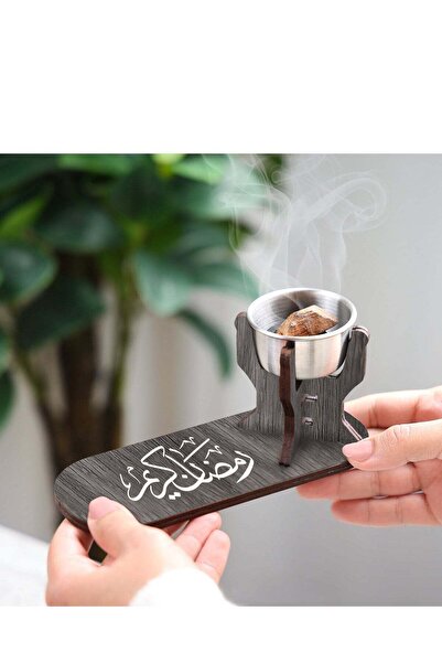 Story of candle A fine wood incense burner with the phrase "Ramadan Kareem" i...