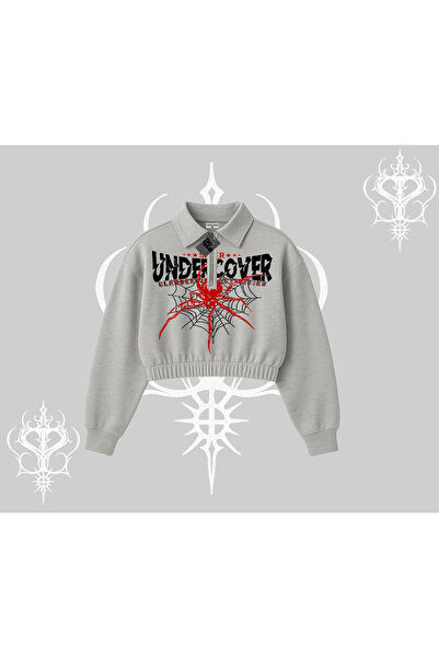 Tarzsokak سترة بيضاء قصيرة بسحاب نصفي من سبايدر أندر كور