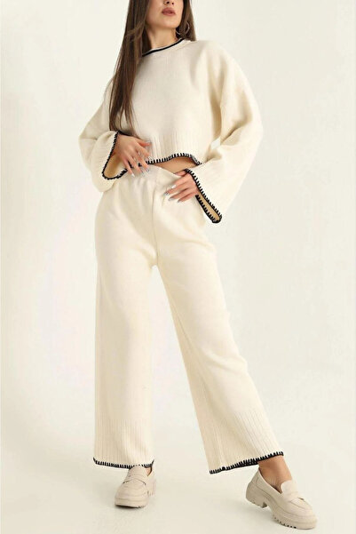 STORY ONLİNE طقم تريكو نسائي مكون من سترة وبنطلون بقصة فضفاضة وتفاصيل خياطة ع...