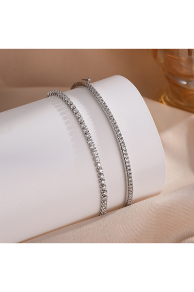 Choice طقم أساور تنس من قطعتين من زاكول الأبيض، مرصعة بالزركون الفيروزي اللامع، مناسبة للنساء، بتصميم عصري وأحجار زرقاء.