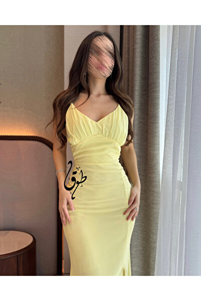 toog فستان سهرة أصفر فاتح بقصة أنثوية وأحزمة رفيعة