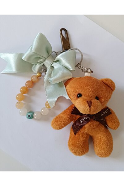 chibi دمية دب لطيفة بلون الخردل وشريط النعناع - تصميم مفصل بتفاصيل حبات العين...