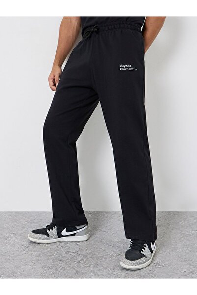 Styli Men Black Slogan Relaxed Fit Joggers