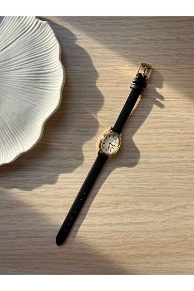 rubsey ساعة يد نسائية كلاسيكية من الجلد ذات تصميم ريترو مينيمال باللون الأسود