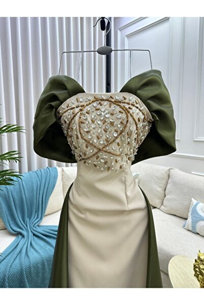 Kendallksa فستان سهرة "أيقوني" يجمع بين رقي اللون البيج وفخامة التفتا الزيتي،