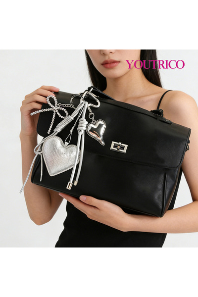 Youtrico سلسلة مفاتيح فاخرة من الفضة على شكل قلب من مادة البولي يوريثان المضف...