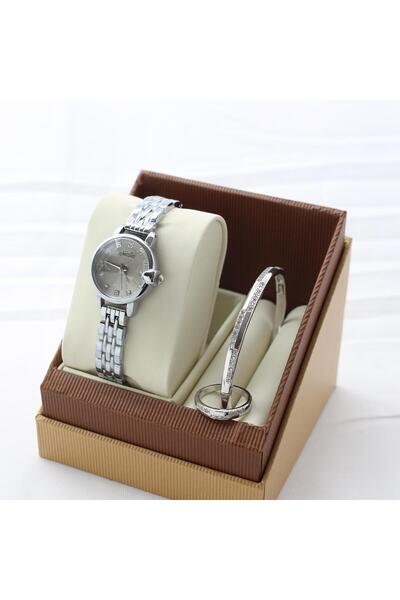 rovan Women's silver gift set: "Snatta" diamond watch, bracelet, and studded ring, presented in a luxurious brown box.