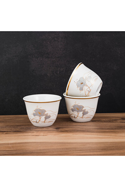 Dania ✨ Luxurious Arabic Coffee Cup Set – 12 Pieces ✨ White porcelain with floral patterns and an elegant gold touch 🤍