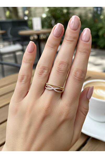 MİNYORA خاتم من الفولاذ باللون الذهبي مع حجر الزركون على شكل اللانهاية