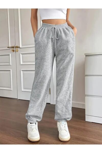 Eşofmancım Γυναικείο ελαστικό παντελόνι σε γκρι χρώμα με ελαφρύ πόδια