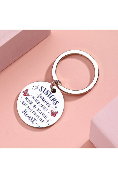 Choice Silver The Sister keychain is printed with the words' Sister Never Apa...