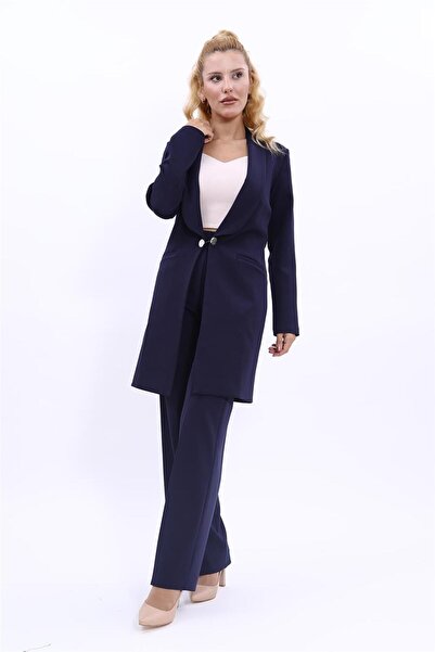 ÖNDER ÖZSOY سترة طويلة بياقة شال وجيوب وبنطلون واسع الساق - أزرق داكن