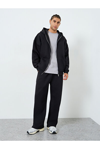 Styli طقم رجالي قصة فضفاضة من جاكيت بغطاء رأس وبنطال رياضي