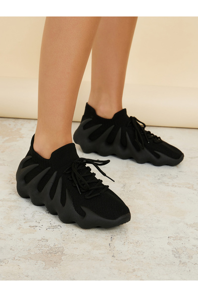 Styli Knitted Upper Abstract Sole Sneakers