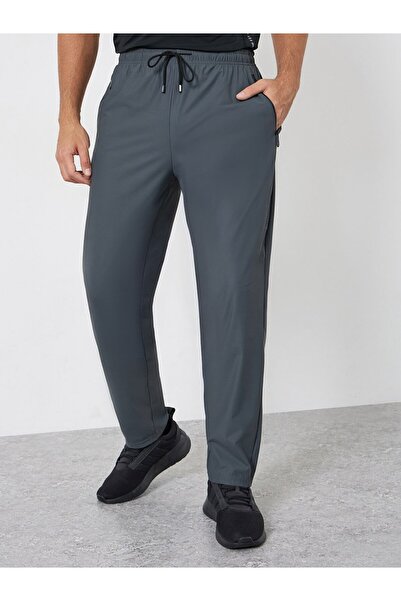 Styli Men Relaxed Track Pant with Side Print and Zipper Detail