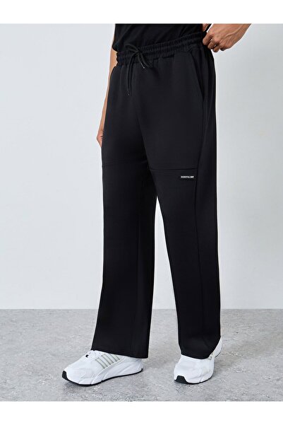 Styli Men Black Badge Detail Oversized Joggers