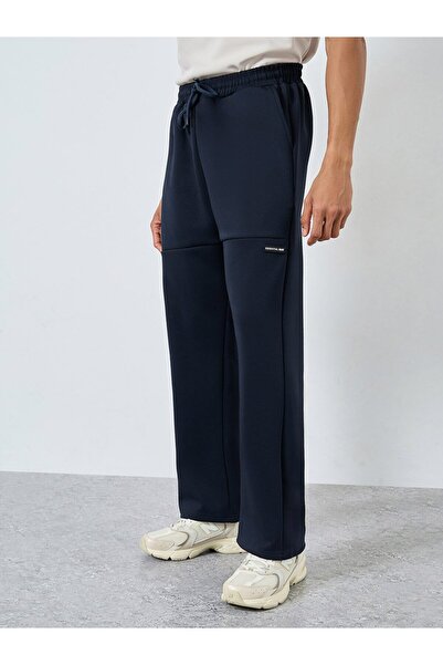 Styli Men Navy Blue Badge Detail Oversized Joggers