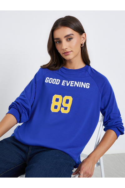 Styli Women Graphic Print Raglan Sleeve T-Shirt