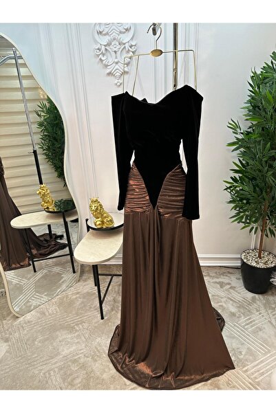 rovan An evening dress that combines black velvet with a copper metallic skirt, V-neck, and long sleeves.