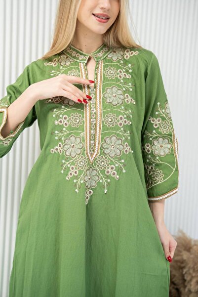 AFandina A sophisticated jalabiya with luxurious embroidery for an elegant an...