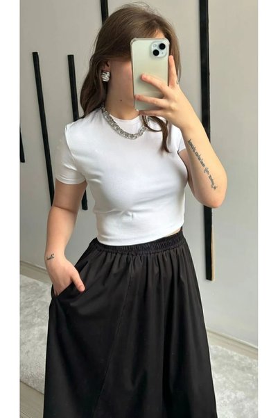 minella kids Buy a Poplin Skirt with Elasticated Pockets for Comfortable Wear.