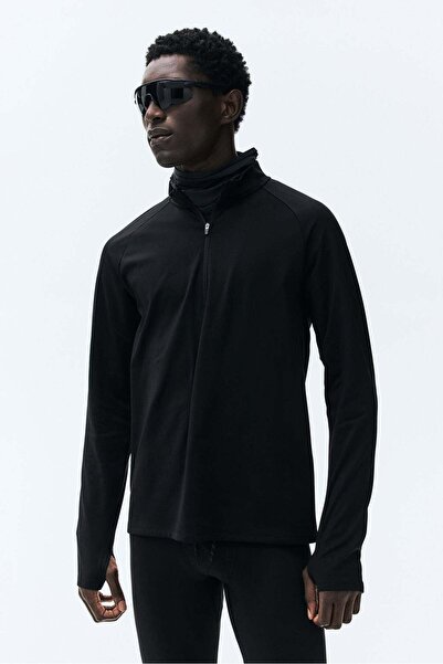 H&M بلوزة رياضية متوسطة الحجم مزودة بسحاب مع ThermoMove™