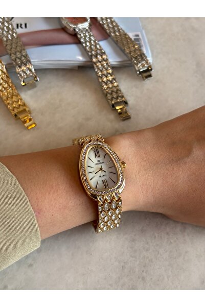 Bluemix Aksesuar SERENAY MODEL BEYAZ-GOLD ÇELİK KADIN KOL SAATİ(hediyeli ürün)