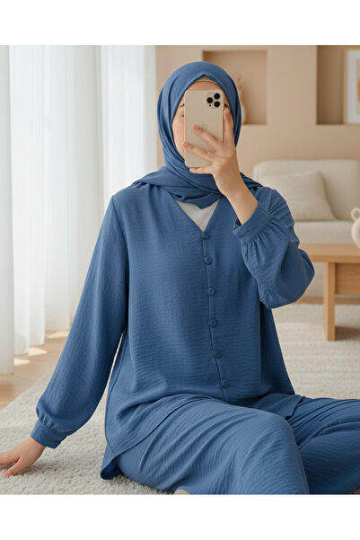 Modamorfo طقم أيروبين بياقة على شكل حرف V مع بنطلون بأزرار - لون نيلي