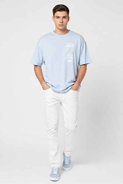 Givenchy تي شيرت رجالي بطبعة جرافيكية بأكمام قصيرة ورقبة دائرية، أزرق