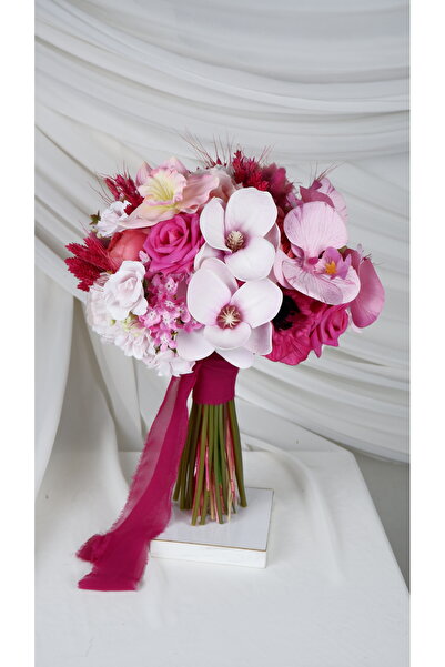 Buketlife fuşya pembe renkli manolya ve orkideli gelinbuketi gelinçiçeği