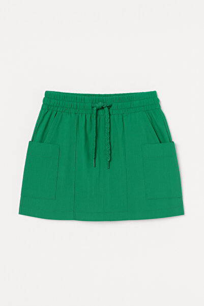 Magu تنورة بناتية قطنية خضراء برباط وجيوب - موديل صيفي مريح