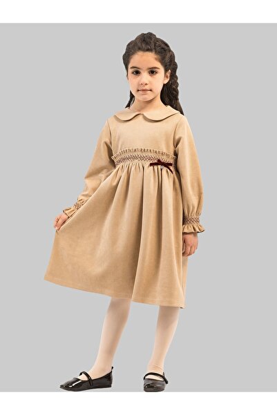 MSBB فستان بناتي الشتوي الرائع يتميز الفستان بلونه البيج الدافئ وتصميمه الأنيق