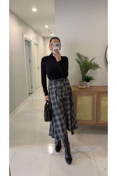 BİRCANÇİL تنورة هوسير سوداء منقوشة بأزرار وربطة خصر