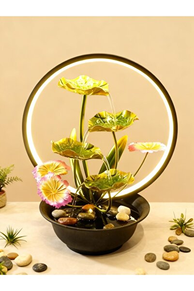 Living A decorative fountain powered by a USB port and an LED light ring