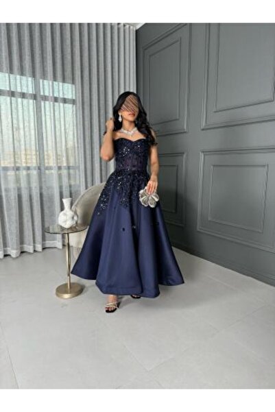 WAREEF FASHION فستان سهرة تفته دبل كلوش المزين بالكلفه المطرزه