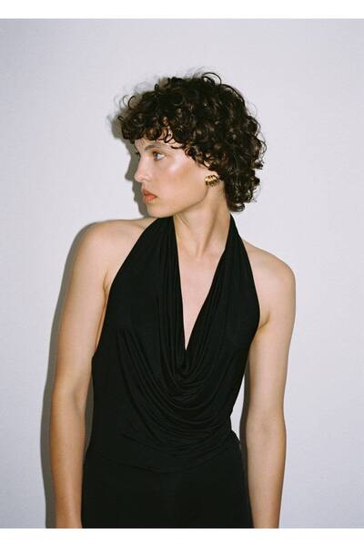 MANGO Woman Kabartmalı halka küpe