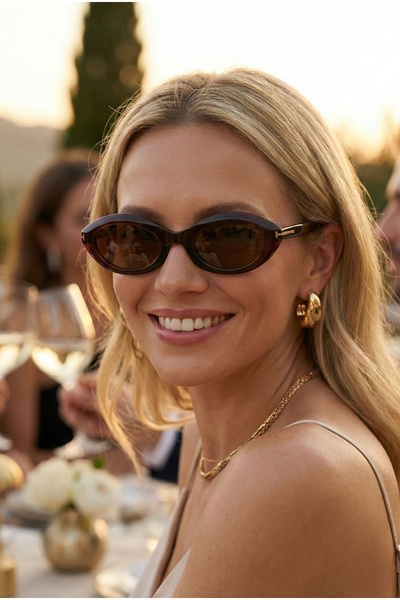 TARSS نظارات شمسية نسائية بتصميم بيضاوي بني اللون من جونو