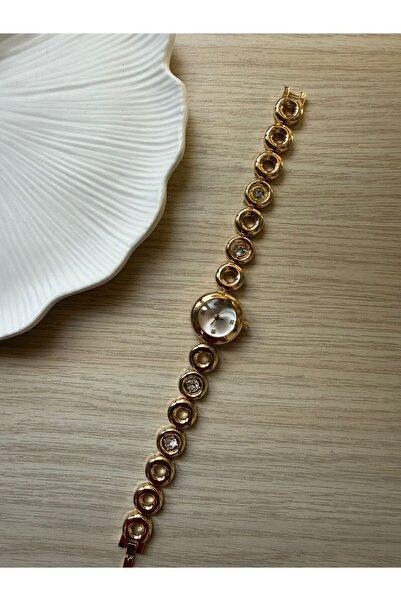 rubsey ساعة يد نسائية كلاسيكية بتصميم معدني بسيط وسلسلة ذهبية مستديرة