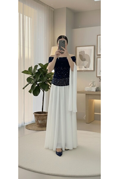 LUMY An evening dress with a luxurious velvet touch and crystal-studded waist...