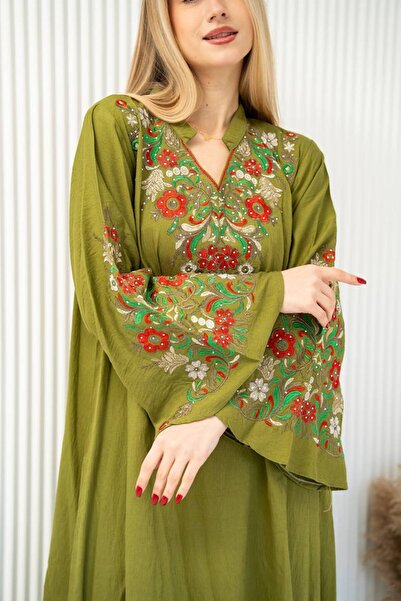 AFandina Embroidered linen jalabiya… an essential outfit you can't do without...