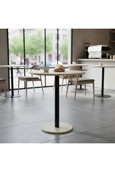 DEC4 A cafe table with a distinctive and modern circular design.