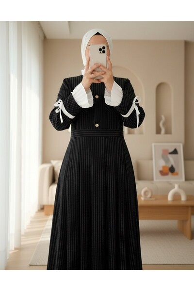 Modamorfo فستان أومزو حشوة كتف بأكمام طويلة وأزرار وتفاصيل جيوب مطوية - أسود