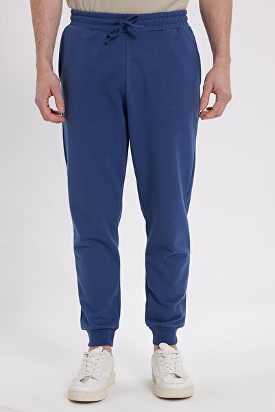 Tudors Men's regular fit classic cut drawstring waist jogger indigo sweatpants with pockets and elasticated cuffs.